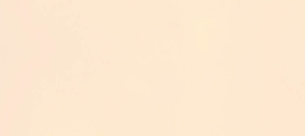 Relaxed, zen and healthy woman meditating on beach with arms raised in prayer pose and sitting legs crossed by sea or ocean. Calm, serene or peaceful yogi in holistic yoga breathing for mental health