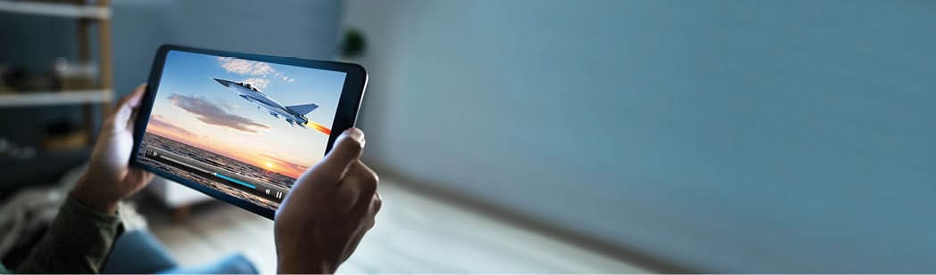 Cropped Image Of Man Watching Movie On Digital Tablet At Home