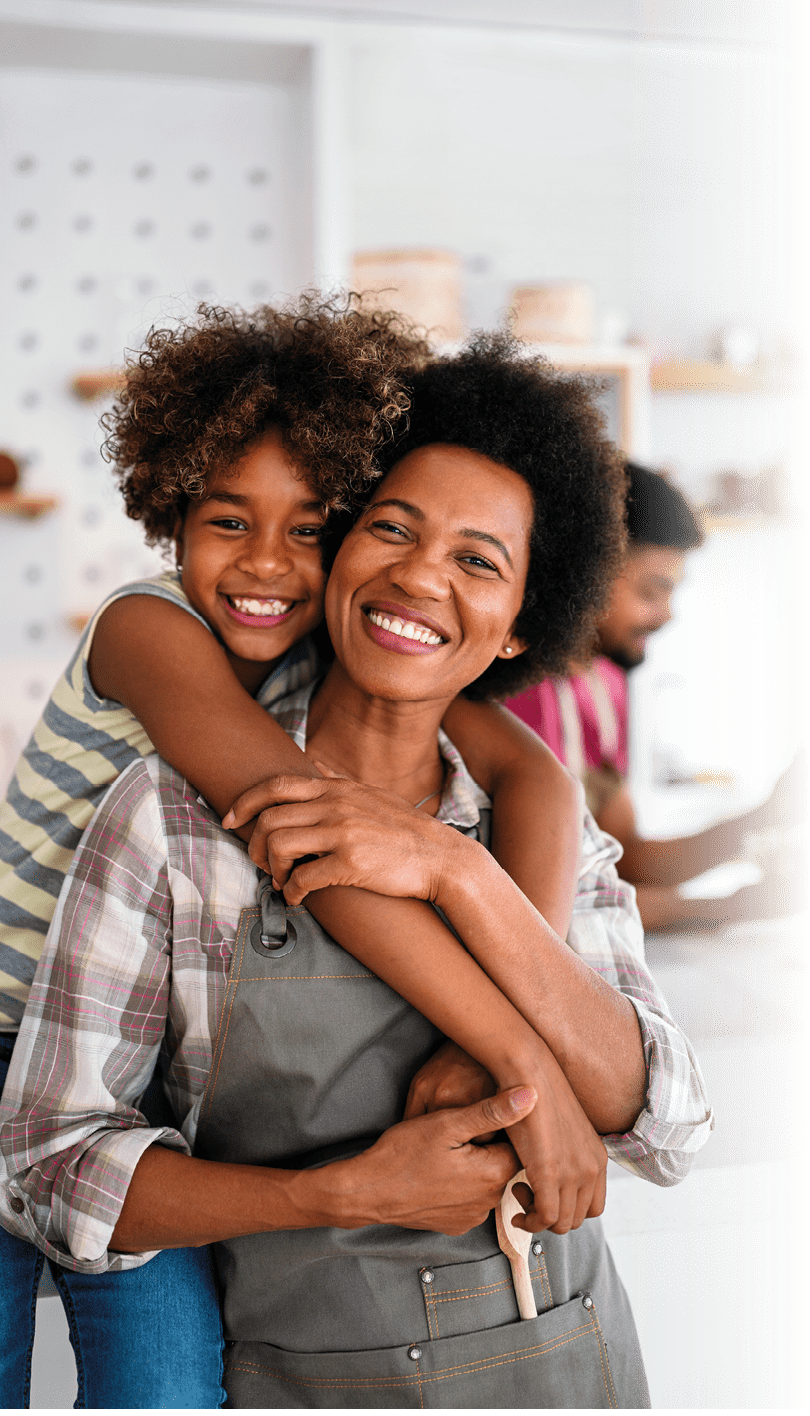 Caring african american mother hugging teenage daughter, happy black mom embracing teen girl cuddling enjoy moment of love, mum and child warm relationship, motherhood concept