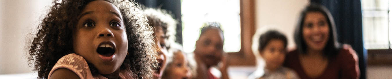 Surprised kids on Christmas Day at home