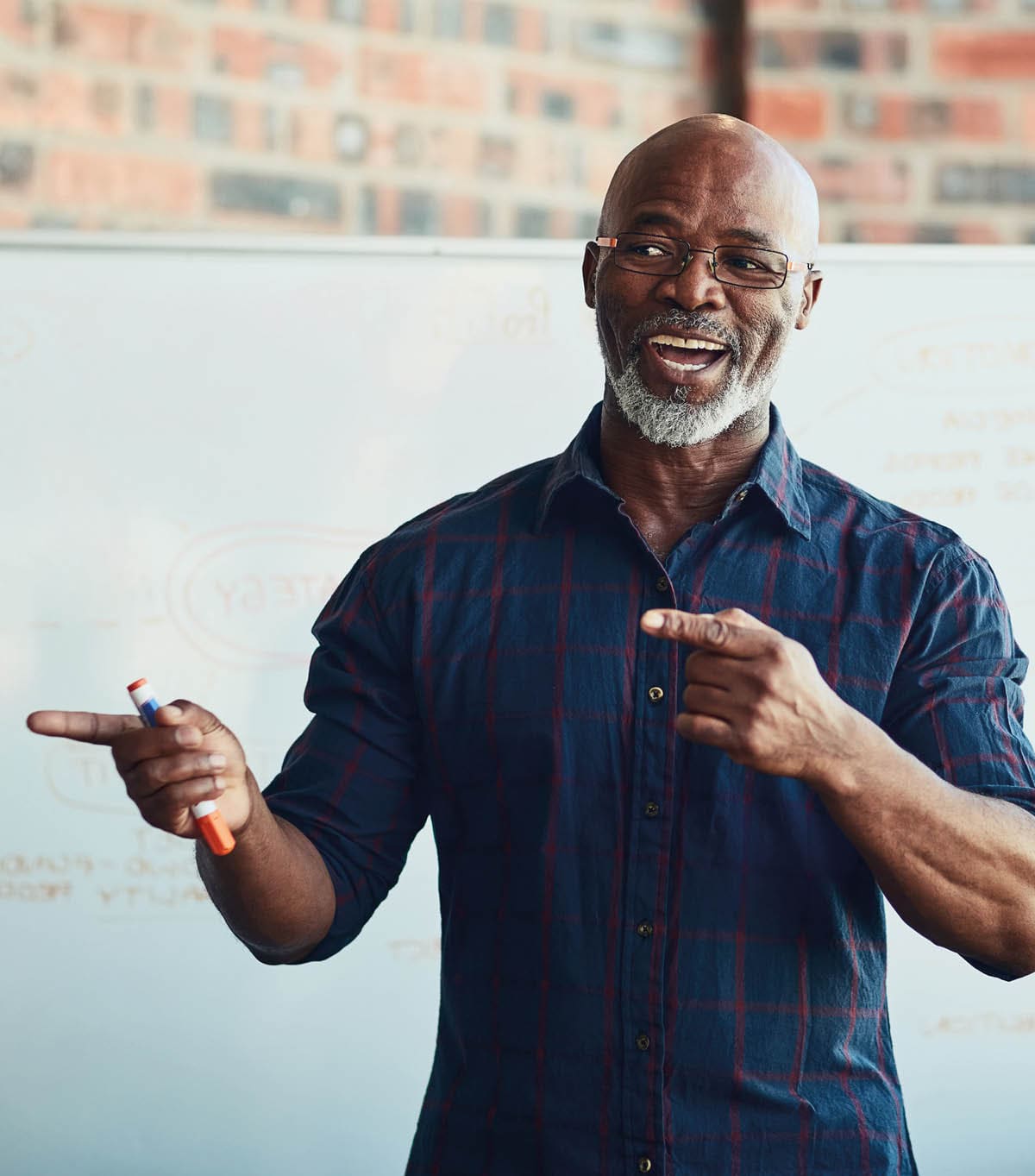 Cropped shot of a mature businessman giving a presentation in the boardroom